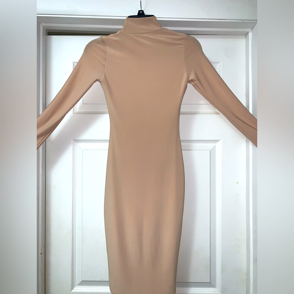 Flattering nude/cream skin tight dress!